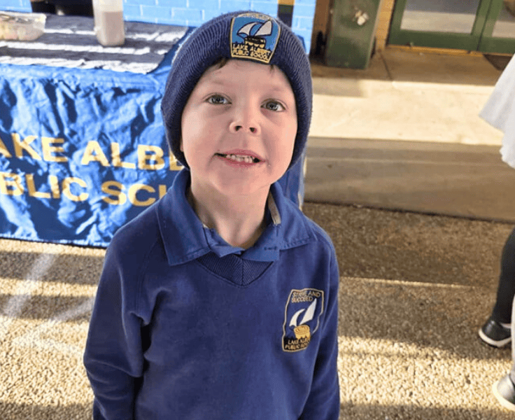 One student looking face-on wearing the LAPS winter uniform.